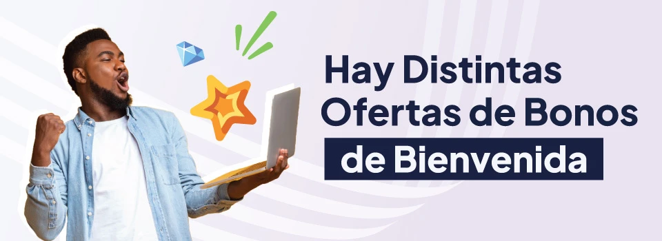 Hombre joven con barba celebrando los bonos de bienvenida de las casas de apuestas mientras sostiene su laptop